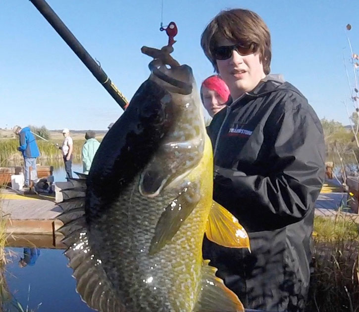 This guest at Fish Fry Lake caught a plate-sized bluegill